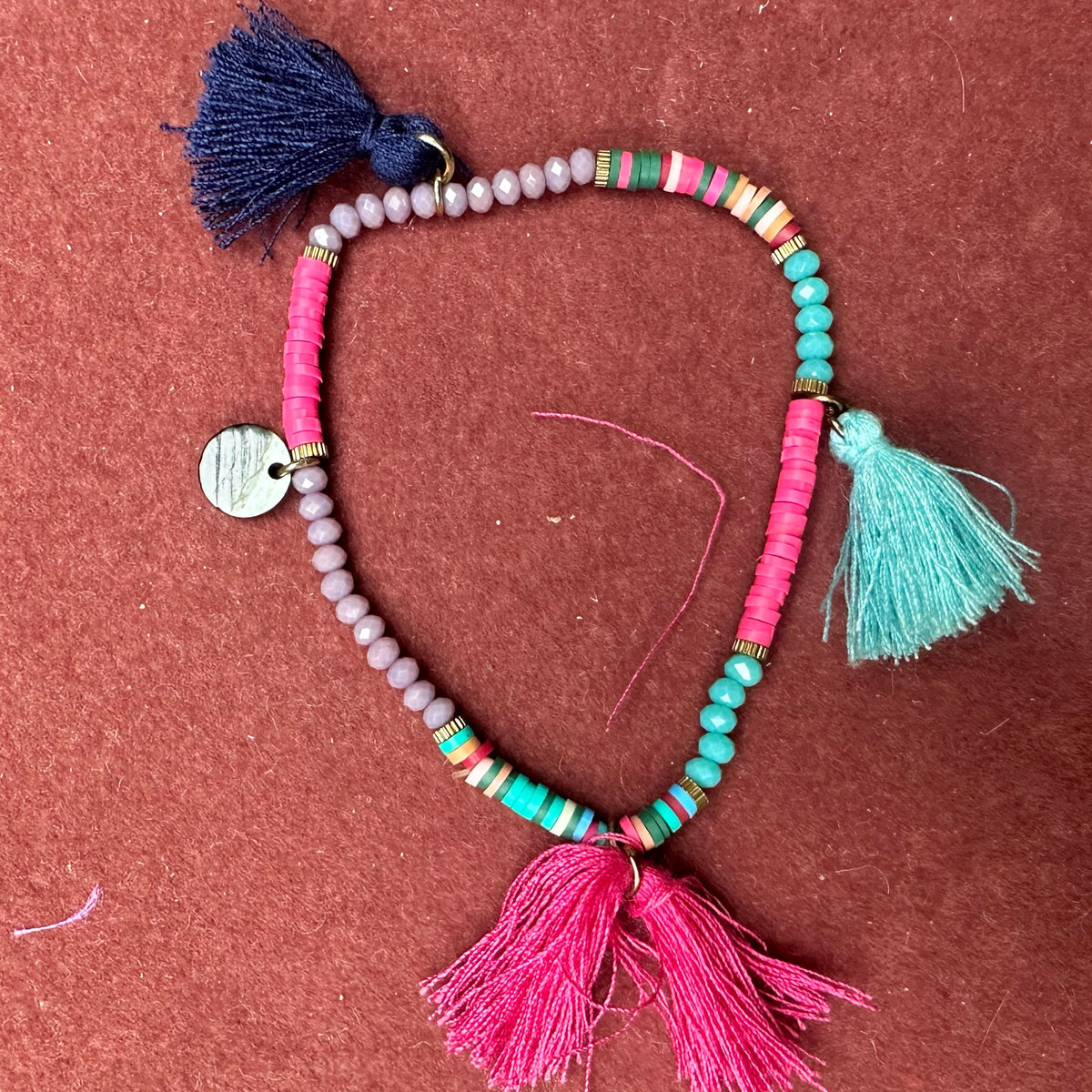 Multi bead tassel charm bracelet